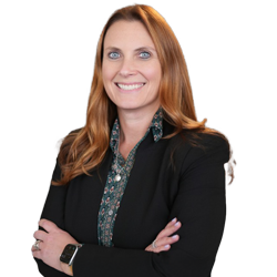 Profile headshot of Colleen Fay in a black suit coat.