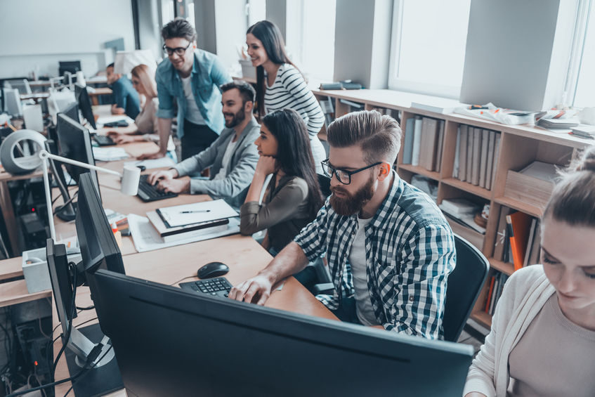 technology teams collaborating in a workspace