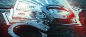 handcuffs and money