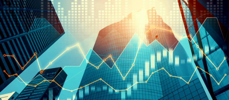 Financial graphs and digital indicators overlap with modernistic urban area, skyscrabber for stock market business concept.