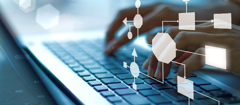 Business process and workflow automation with flowchart, businessman in background