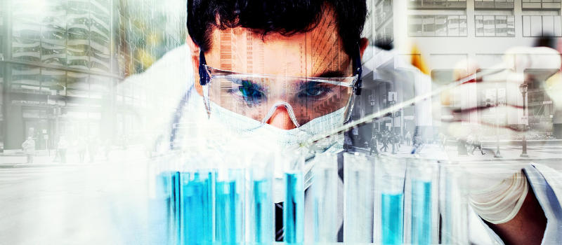 A male scientist in a lab doing research.