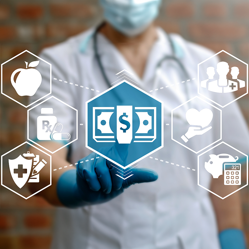 A medical professional touching a graphic of money.