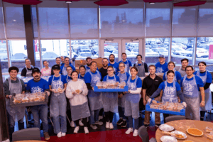 Withum's team members are participating in Withum's Week of Caring with big smiles.