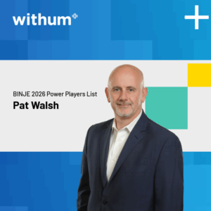 Pat Walsh, the CEO of Withum, is smiling in a professional headshot with a blue and white background featuring the Withum logo.