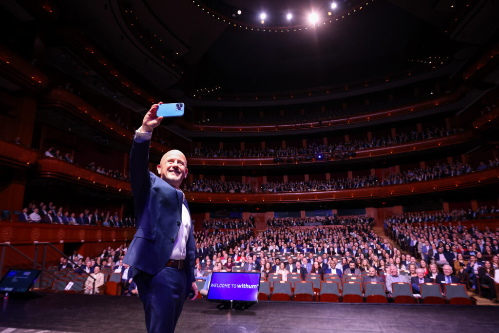Withum's CEO, Pat Walsh, is taking a selfie at Withum's 2026 State of the Firm Celebration inside the NJPAC.