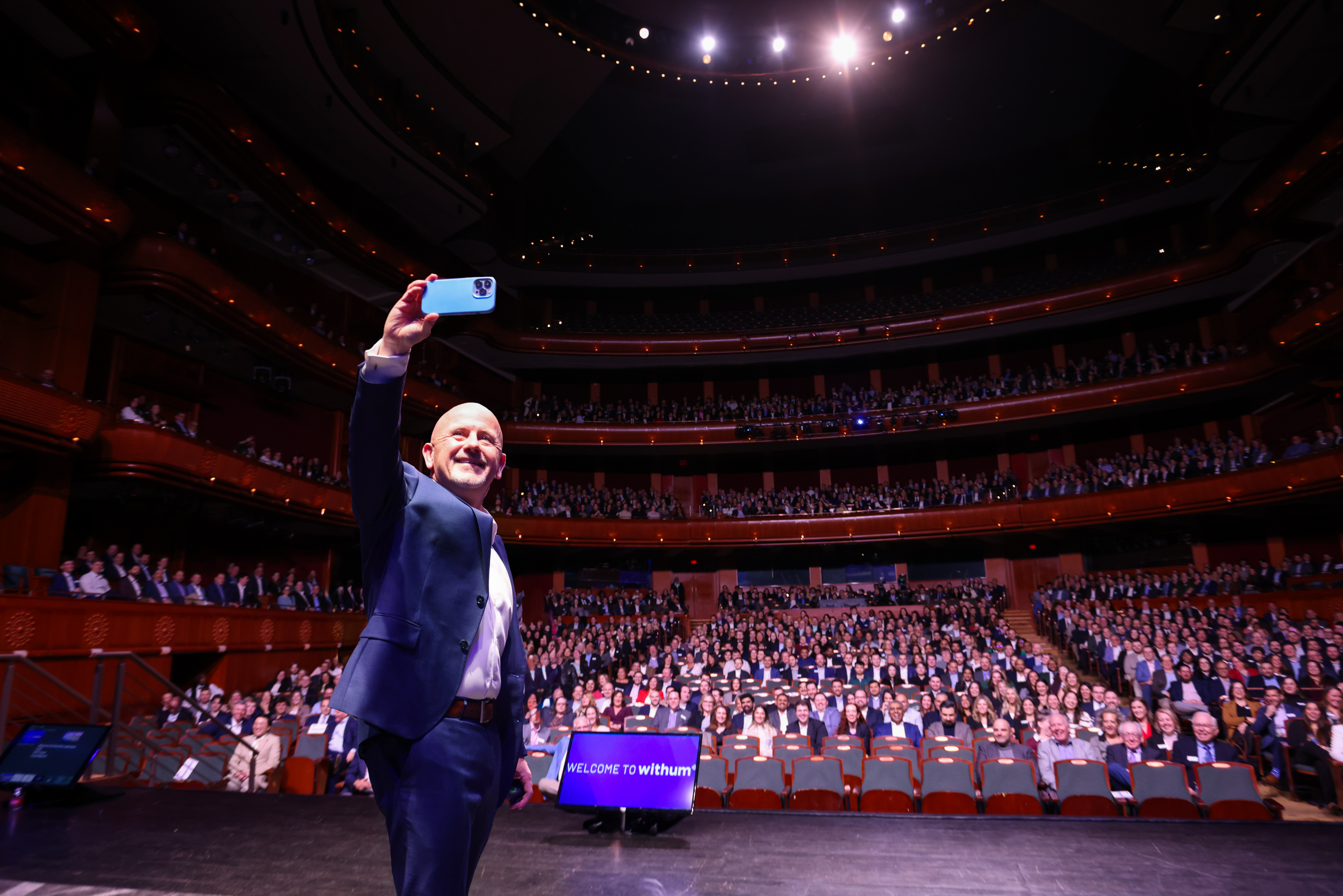 Withum's CEO, Pat Walsh, is taking a selfie at Withum's 2026 State of the Firm Celebration inside the NJPAC.