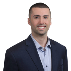 Profile headshot of Anthony Pagano in a dark blue suit coat.