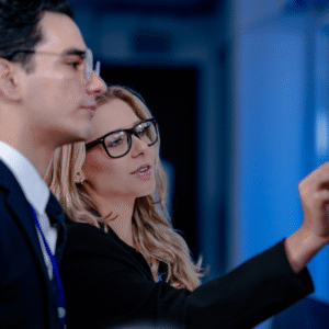 co-workers reviewing ai analysis data on digital screen.