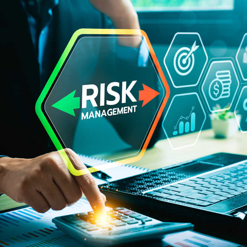 Business Professional Analyzing Risk Management Strategies with Digital Dashboard, Calculator, and Financial Data.