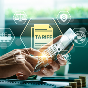 Businessman Using Calculator to determine Global Import Export tariff refund.