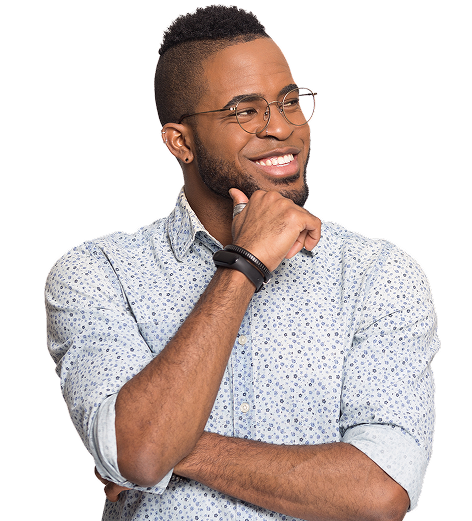 Smiling man in a collared button down shirt with his arms crossed looking toward the right and pondering life.