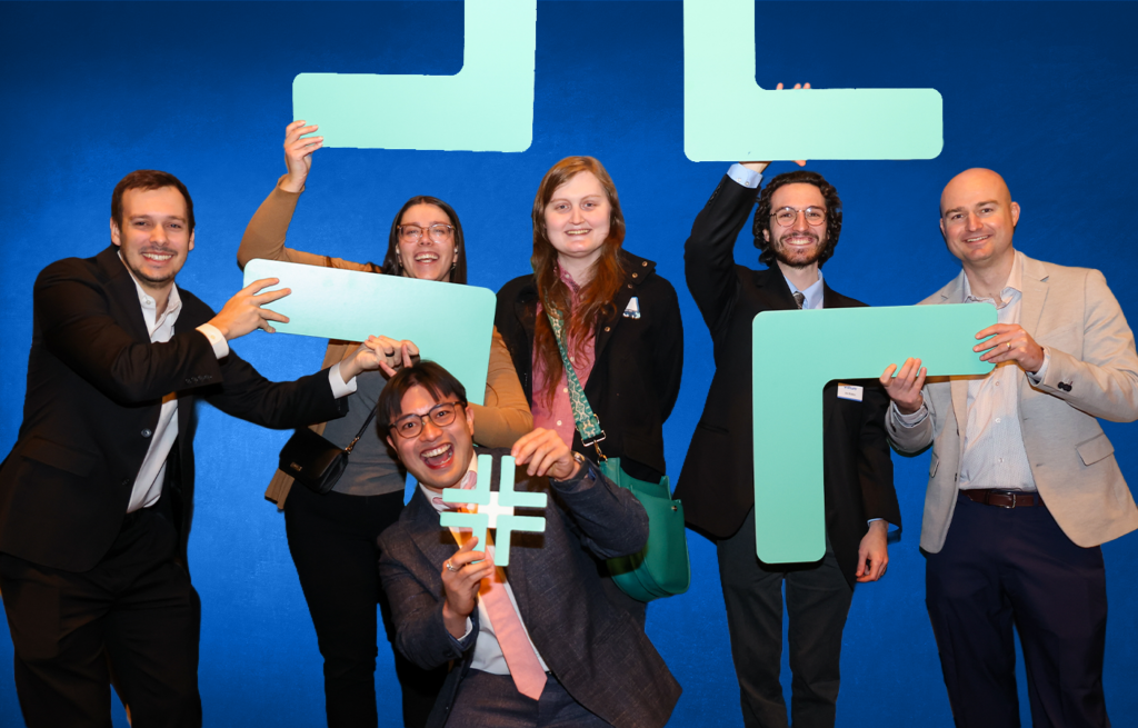 Withum team members with teal plus sign