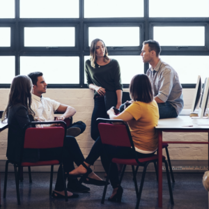 employees having a meeting at a creative agency.