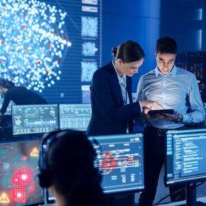 business leaders analyzing cybersecurity risk