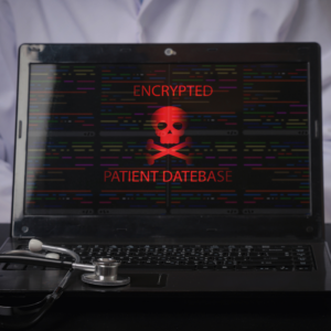 Alarming healthcare data breach concept showing laptop with red skull symbol and stethoscope representing serious cyber attack.